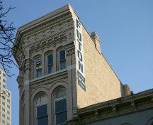 Detail view of the roofline of the Telegram Building, Winnipeg, 2005; Historic Resources Branch, Manitoba Culture, Heritage and Tourism 2005