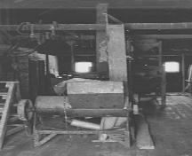 General view of seed cleaning machinery at Seager Wheeler's Maple Grove Farm, 1994.; Parks Canada Agency / Agence Parcs Canada, E. Mills, 1994.
