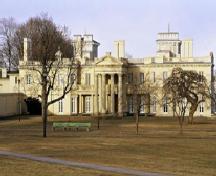 View of the main façade of Dundurn Castle, showing its irregular massing and its picturesque design, 1995.; Parks Canada Agency / Agence Parcs Canada, J. Butterill, 1995.