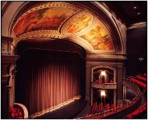 Featured is the stage and proscenium arch.; Archives of Ontario.