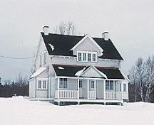 General view of Building 84, showing the one-and-a-half-storey massing with a gable roof, circa 2004.; Parks Canada Agency / Agence Parcs Canada, circa / vers 2004.