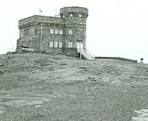 General view of Cabot Tower, showing its two-storey 9.4-metre (30-foot) square structure and three-storey 15.24-metre (50-foot) octagonal tower, 1988.; Parks Canada Agency / Agence Parcs Canada, I. Doull , 1988.