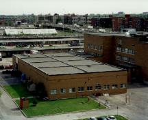 Vue aérienne du complexe de l’Office national du film, 1998.; Public Works and Government Services Canada / Travaux publics et Services gouvernementaux Canada, 1998.
