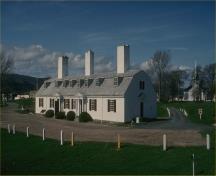 General view of the Fort Anne National Historic Site of Canada  showing the surviving remnants of the original officers’ quarters, namely the footprint and form of the building, and the original fireplaces, 1994.; Parks Canada / Parcs Canada 1994